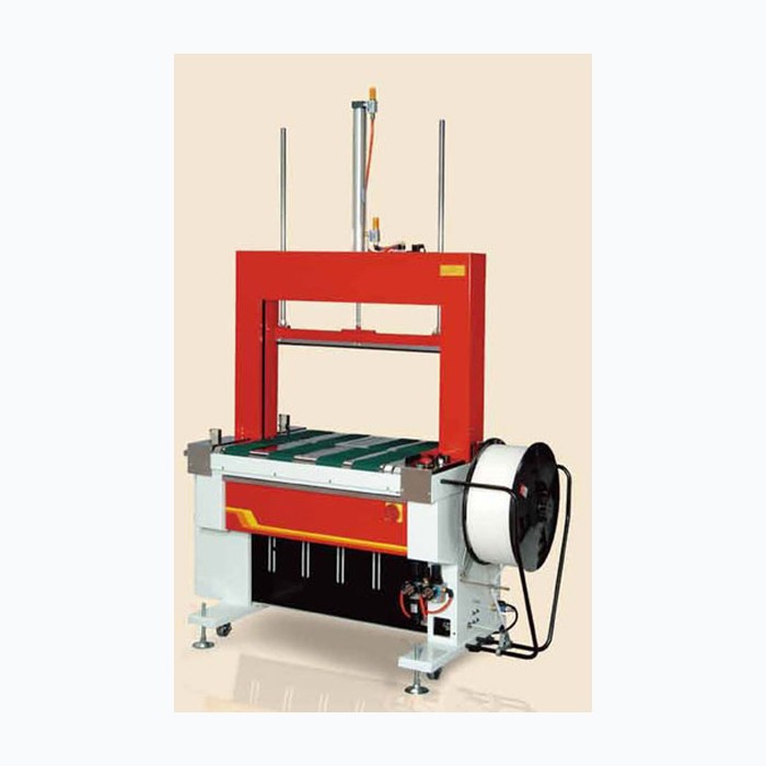 Fully automatic strapping machine with pneumatic press